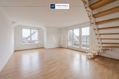 Über den Dächern – charmante Maisonette mit Weitblick und zwei TG-Stellplätzen