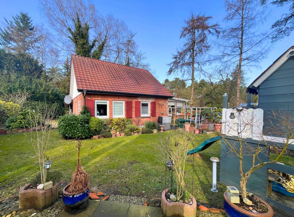 Immobilie in Hatten - Kleines Glück im Grünen – charmantes Häuschen mit Gartenidylle in Hatten - Bild 1