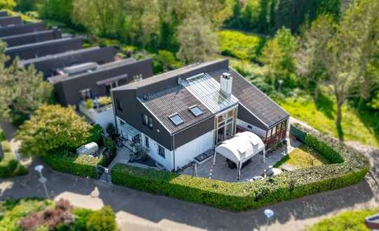 Exklusives Architektenhaus mit Wintergarten, Galerie und Einliegerwohnung in begehrter Lage