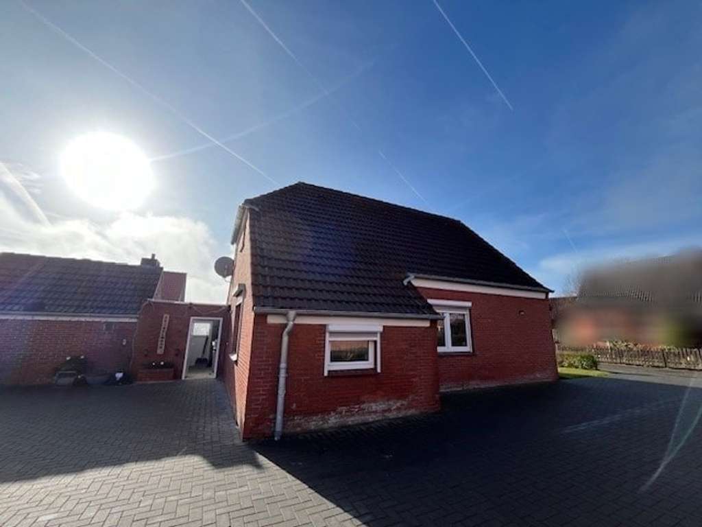 Immobilie in Hagermarsch - Einfamilienhaus in Sackgassenlage mit Photovoltaikanlage und großem Nebengebäude in Hagermarsch  - Bild 2