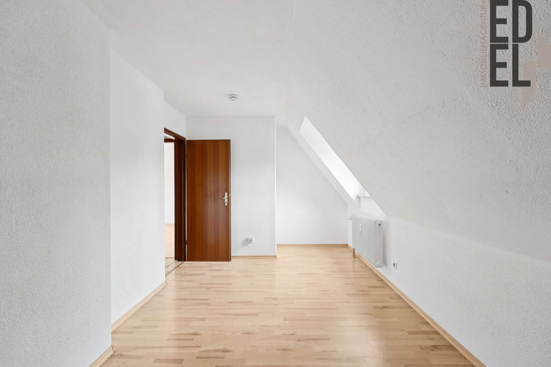 Immobilie in Neutraubling - 3-Zimmer-Maisonette mit Balkon & Stellplätzen in ruhiger Lage von Neutraubling - Bild 1