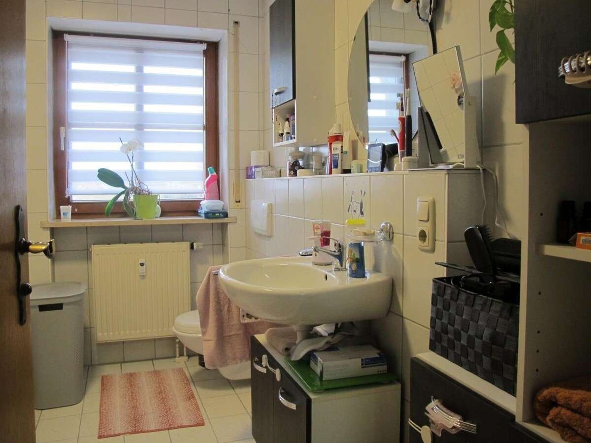 Immobilie in Mehring - Schön geschnittene 3-Zi ETW, 1. OG m. Balkon, Gartennutzung u. TG Stellplatz,  frei ab Mai/Juni 2026 - Bild 0