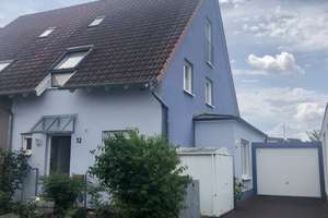 Gepflegte Doppelhaushälfte mit Kamin, ausgebautem Dachstudio und schönem Garten in Weisenheim/Sand