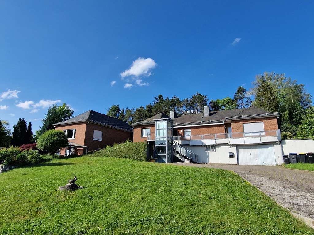 2 topp gepflegte Häuser / Traumhafter Luxusbungalow mit zweiter, separater Wohneinheit...