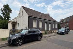 Handwerkertraum mit großem Garten, Garage und Stellplatz: Vielseitiges Ein- bis Dreifamilienhaus.