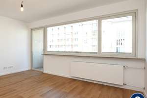 AIGNER - Kürzlich Sanierte 2-Zimmer-Wohnung mit Ost-Balkon nahe der Münchner Freiheit