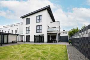Exklusives Wohnen auf einer Ebene – Neubau-Eigentumswohnung mit Garten und Wellnessbereich