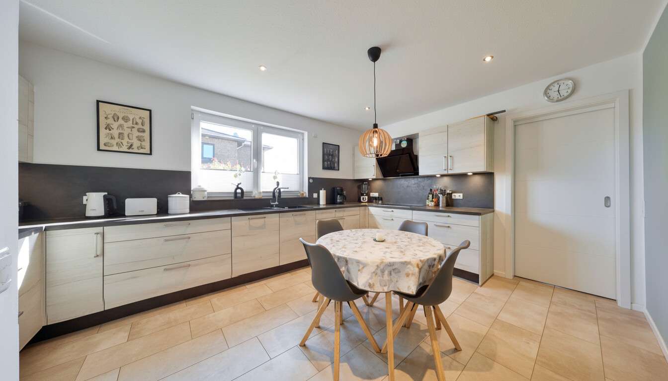 Immobilie in Dötlingen - Neuwertiges Ein-/ Zweifamilienhaus in energetischer Bauweise in Dötlingen Brettorf - Bild 1