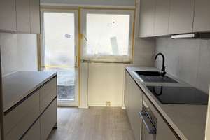 Erstbezug! Kernsanierte 3-Zimmer-Wohnung mit EBK, Garage & 2 Balkone