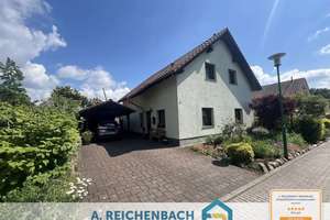Familienfreundliches Einfamilienhaus mit Garten & Fußbodenheizung in ruhiger Lage von Bad Düben! – Rotkehlchenweg 3, 4849 Bad Düben – Vorschaubild 1