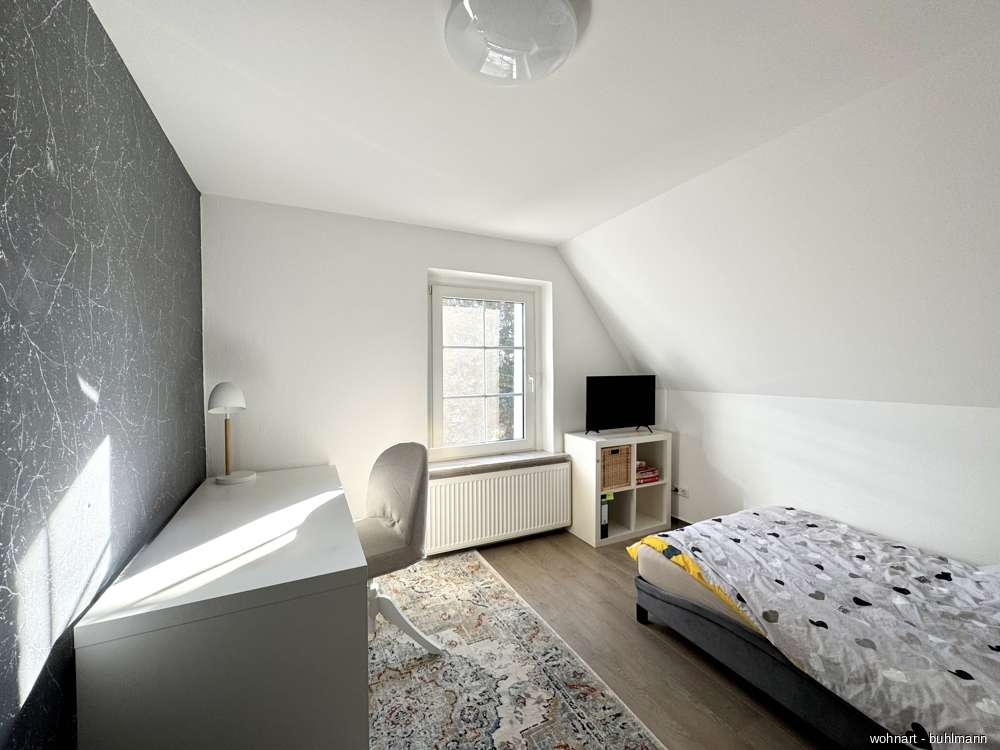 Immobilie in Nordharz - Familienfreundliche Doppelhaushälfte mit sonnigem Garten und vielseitigen Nutzungsmöglichkeiten - Bild 2