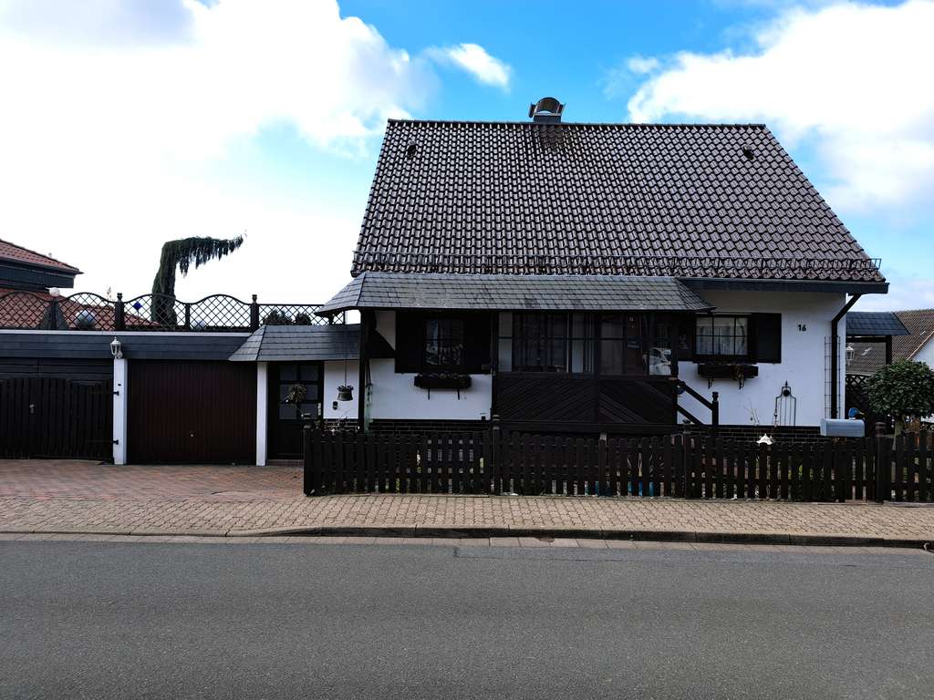 Immobilie in Wölpinghausen - Einfamilienhaus mit Garage in Wölpinghausen, 6 Zimmer - Bild 0