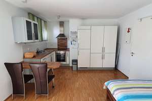Stilvolle, gepflegte 1-Zimmer-Erdgeschosswohnung mit EBK in Garching bei München