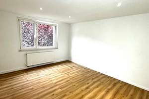 Hochwertig renovierte Wohnung mit großzügiger Wohnküche und individuellem Wohnkomfort