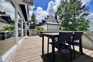 Wohn- und/oder Gewerbeeinheit mit Wintergarten und großer Dachterrasse sowie TG-Stellplätzen