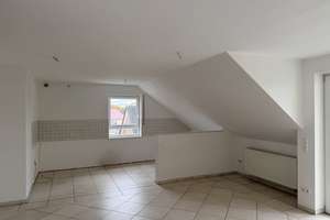 Wohnen mit Charakter: 3-Zimmer-Dachgeschosswohnung in Schloß Holte-Stukenbrock