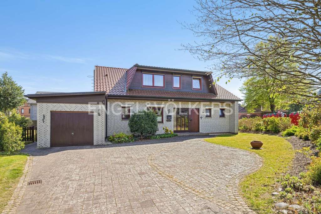 Immobilie in Delingsdorf - Familienfreundliches Einfamilienhaus mit modernem Komfort und idyllischem Grundstück - Bild 0