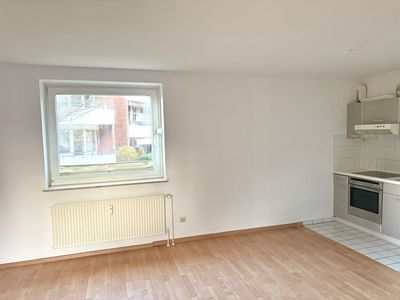 Charmante Erdgeschosswohnung mit Einbauküche & privatem Autostellplatz