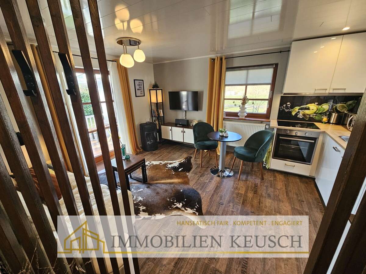 Immobilie in Vollersode - Traumhaftes und massiv gebautes Tiny House mit überdachter Terrasse & Schuppen in ruhiger Lage - Bild 0