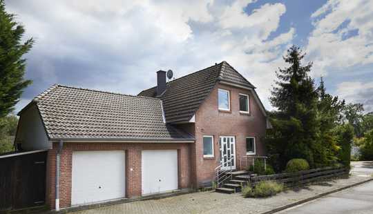 Bild von Wohnhaus mit Garten und Massivgarage in Isernhagen-Neuwarmbüchen