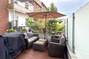 Direkt investieren – vermietete 2-Zimmer-Eigentumswohnung mit Terrasse in Düsseldorf-Flingern