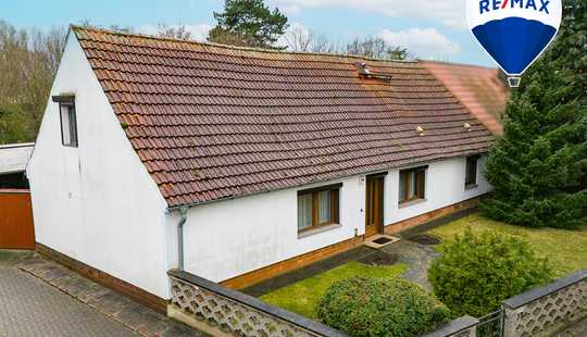 Bild von Gepflegte Wohnidylle: Einfamilienhaus mit umfangreichem Nebengelass und Gartenvielfalt