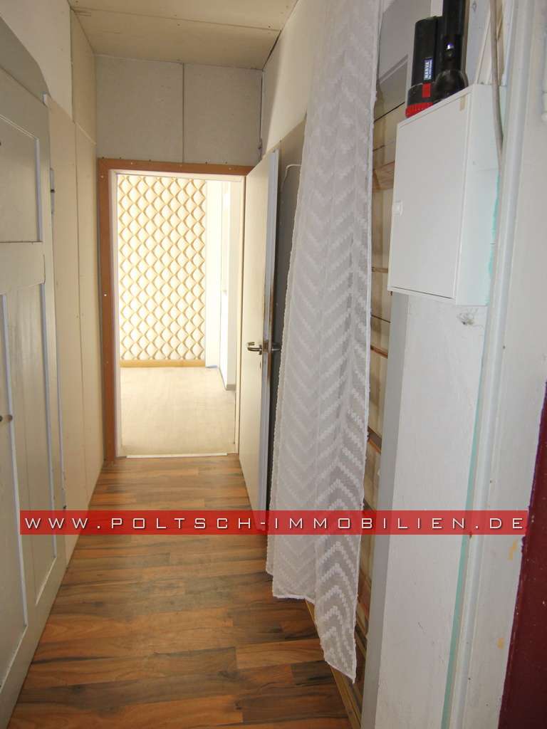 Immobilie in Weida - Doppelhaushälfte mit Keller und Garten in ruhiger Lage von Weida - Bild 2