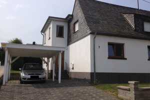 Preiswerte Doppelhaushälfte (4SZ ; 1WZ ; 2B ; 1K ; 2FL ; 1KE) in Ettringen – Hochsteinsiedlung 7, 56729 Mayen-Koblenz (Kreis) – Vorschaubild 1
