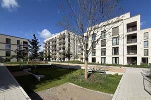 2-Zimmer-Neubauwohnung mit großem Gartenanteil