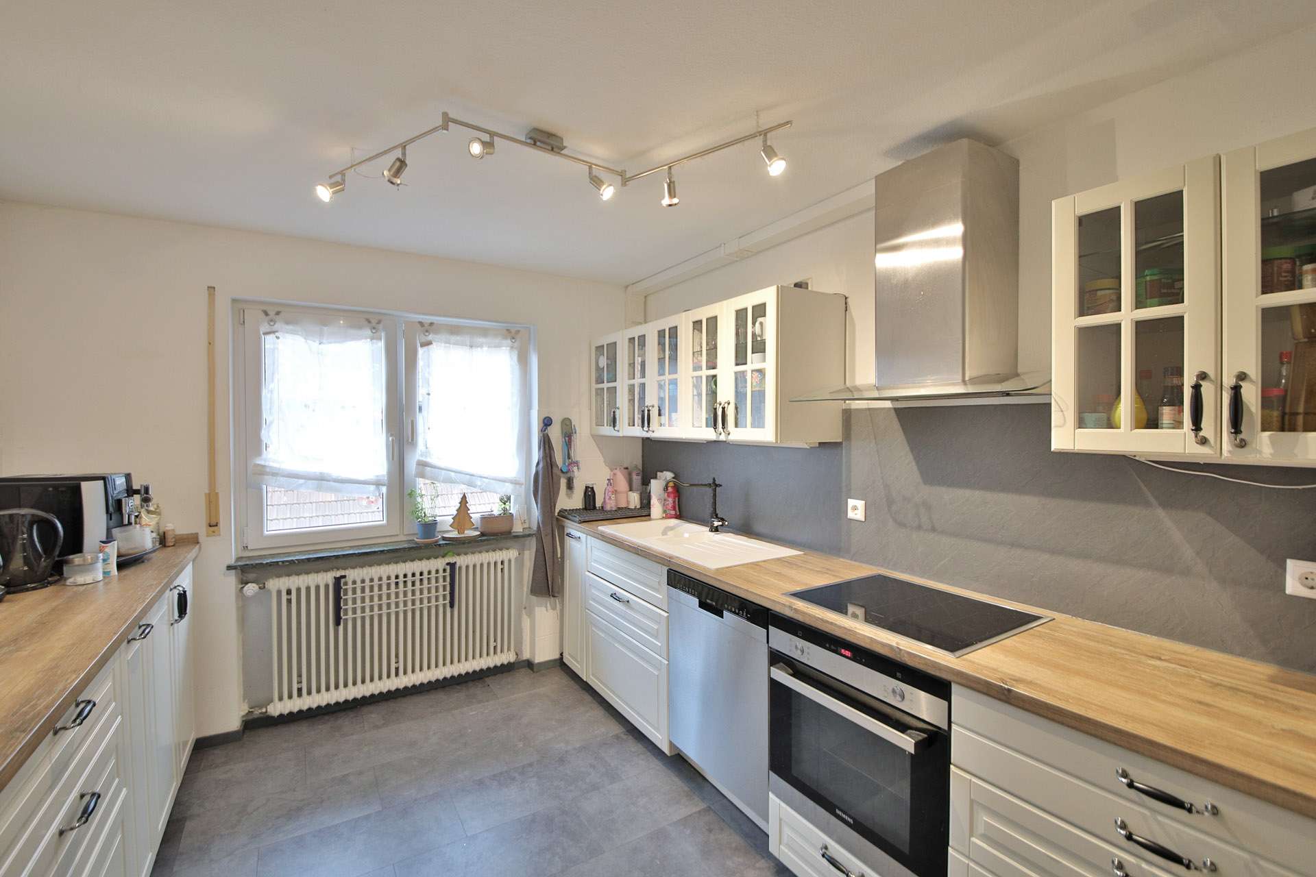 Immobilie in Muggensturm - Charmante 4-Zimmer-Wohnung mit Garten & Garage in zentraler Lage in Muggensturm - Bild 1