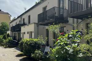 Familienfreundliches Townhouse in Untergiesinger Innenhoflage