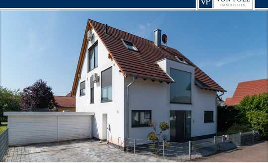 Modernes, energieeffizientes Einfamilienhaus mit Garten in ruhigem, familienfreundlichem Wohngebiet
