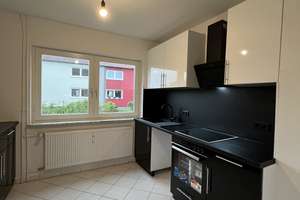 Ihr Glück startet hier! Top 3-Raum-Wohnung mit EBK & Mietergarten – Mühlenbusch 29, 38448 Vorsfelde, Wolfsburg – Vorschaubild 2