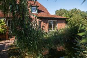 Einfamilienhaus mit Einliegerwohnung 
in idyllischer Lage – Die vollständige Adresse der Immobilie erhältst du vom Anbieter., 28879 Grasberg – Vorschaubild 2