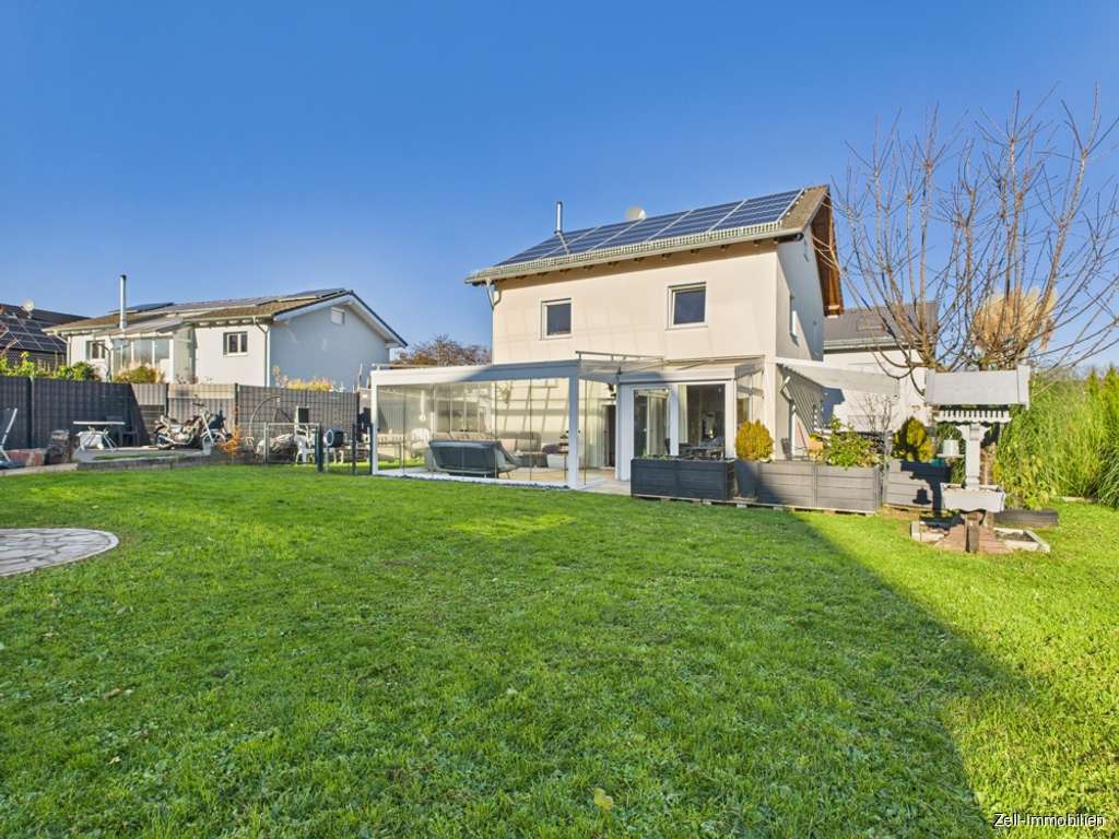 Immobilie in Geisenheim - Neuwertiges, energieeffizientes Einfamilienhaus mit Wintergarten und 801 qm großem Grundstück - Bild 0