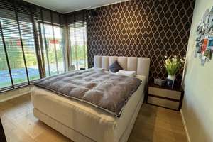 Luxuriöse 6-Zimmer-EG-Wohnung (Isargärten) mit hochwertiger Innenausstattung, Heimkino und EBK – Maria-Einsiedel-Straße 17, 81379 Thalkirchen, München – Vorschaubild 12