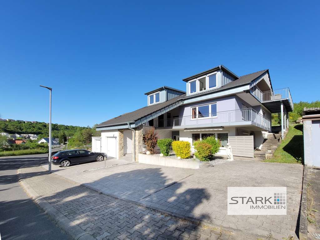 Immobilie in Grünsfeld - Wohnhaus mit traumhafter Aussicht – ideal für Familie, Generationenwohnen & Homeoffice! - Bild 1