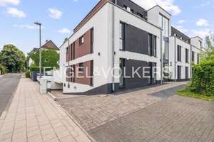 Exklusive Wohnung mit Terrasse, eigenem Garten & zwei Tiefgaragenstellplätze