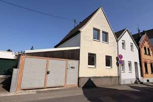 Köln-Sürth sanierungsbedürftiges Einfamilienhaus mit Ausbaumöglichkeiten