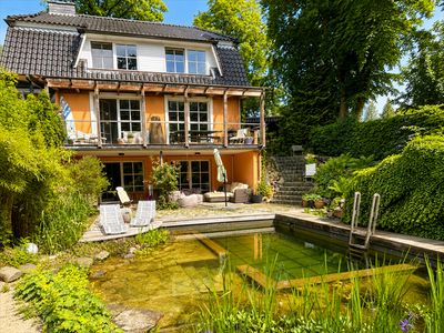 Wohnkonzept voller Licht und Weite: Doppelhaushälfte mit SchwImmteich in ruhiger Lage!