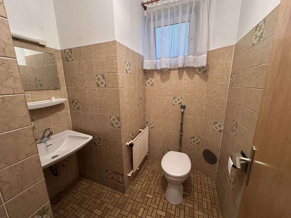 Immobilie in Elsenfeld - Herrlicher Ausblick und ruhige Lage ... Einfamilienhaus mit viel Platz zum Ausbreiten! - Bild 1