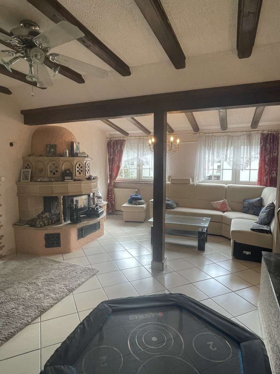 Immobilie in Florstadt - Einfamilienhaus im Bungalowstil mit großem Garten und Terrasse - Bild 2