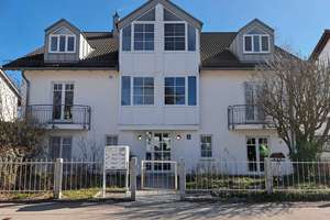 Charmante 3-Zimmer Maisonette-Wohnung mit Balkon in Harlaching