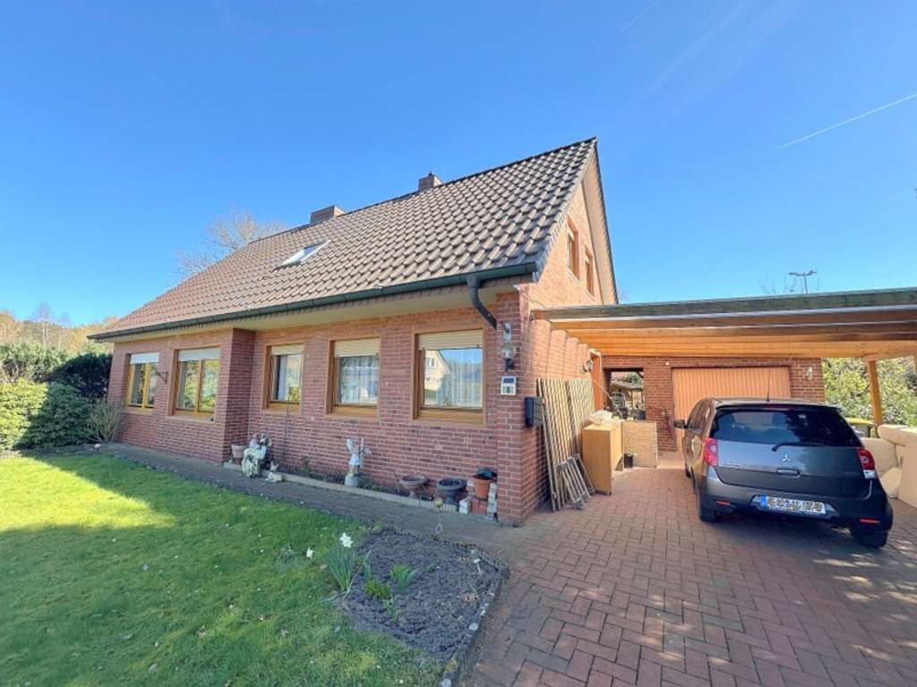 Immobilie in Haselünne - Wohnhaus mit Garage & Carport in Haselünne-Flechum - Bild 1