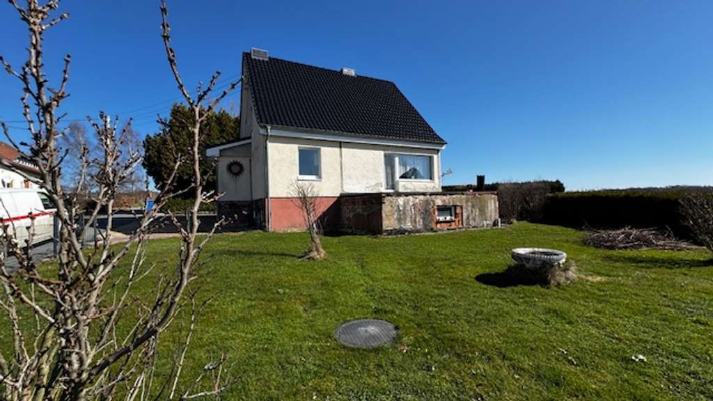 Immobilie in Reichenbach/Oberlausitz - Freistehendes Einfamilienhaus (EW65) mit Keller und Garage auf landschaftlich reizvollem Grundstück - Bild 2