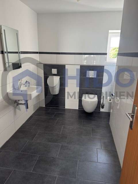 Immobilie in Leuterod - Modernisierte Doppelhaushälfte mit 3 Wohneinheiten in Leuterod - Bild 0