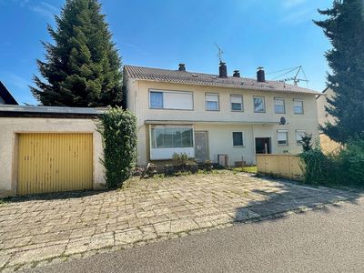 Mehrfamilienhaus mit 3 Wohnungen und Gewerbeeinheit - zentrale Lage, vielseitige Möglichkeiten