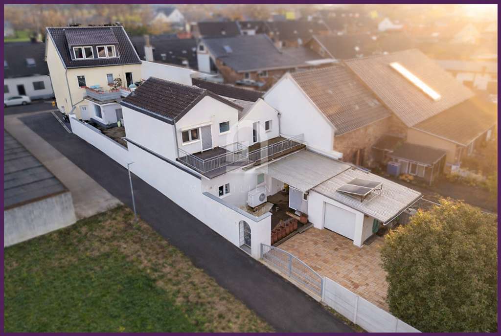 Immobilie in Elsdorf - Wohnen & Vermieten – besonderes Ensemble mit Garten, Garage & Perspektive - Bild 4