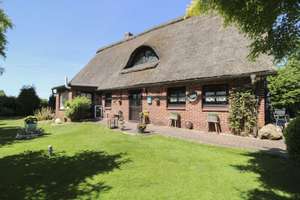 Reetdachidylle in ruhiger Feldrandlage von Wischhafen - Landhaus mit Ferienwohnung – Die vollständige Adresse der Immobilie erhältst du vom Anbieter., 21737 Wischhafen – Vorschaubild 2