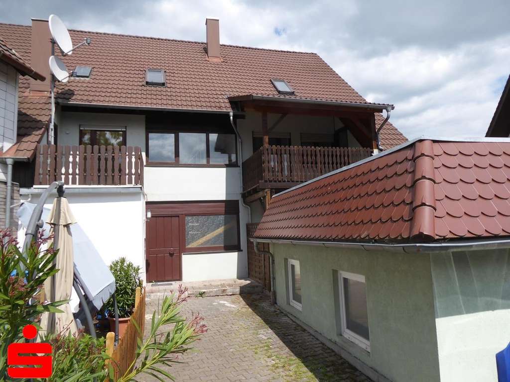 Immobilie in Forchtenberg - 5-Zimmer-Eigentumswohnung mit kleinem Grundstück mitten in Ernsbach - Bild 0